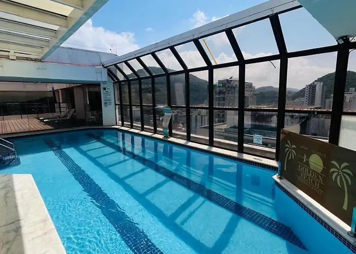 Guarujá Golden Beach 158 - Conforto com Piscina Climatizada